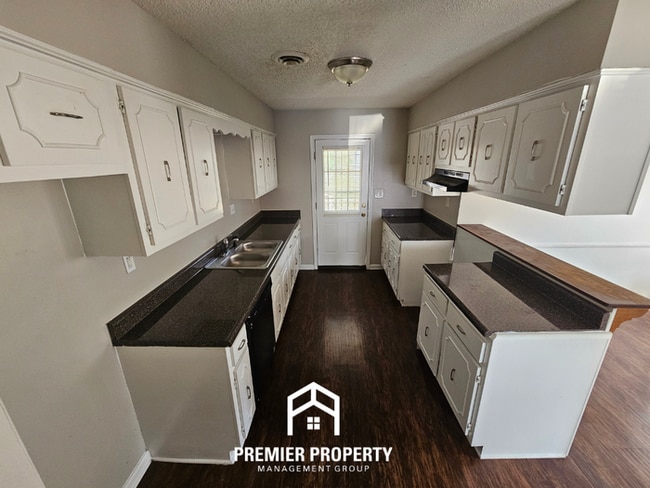 Photo - Stunning 3BR/2BA Home | 1,644 Sq Ft, Floor-to-Ceiling Stone Fireplace & High Ceilings