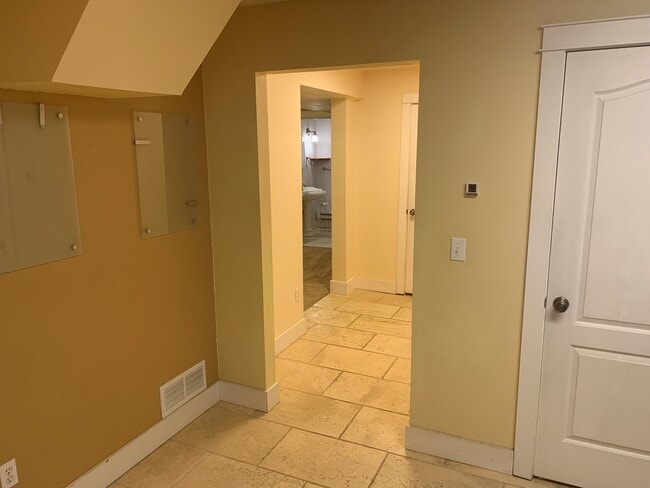 hallway to living room/bath - 2569 N County Road 29