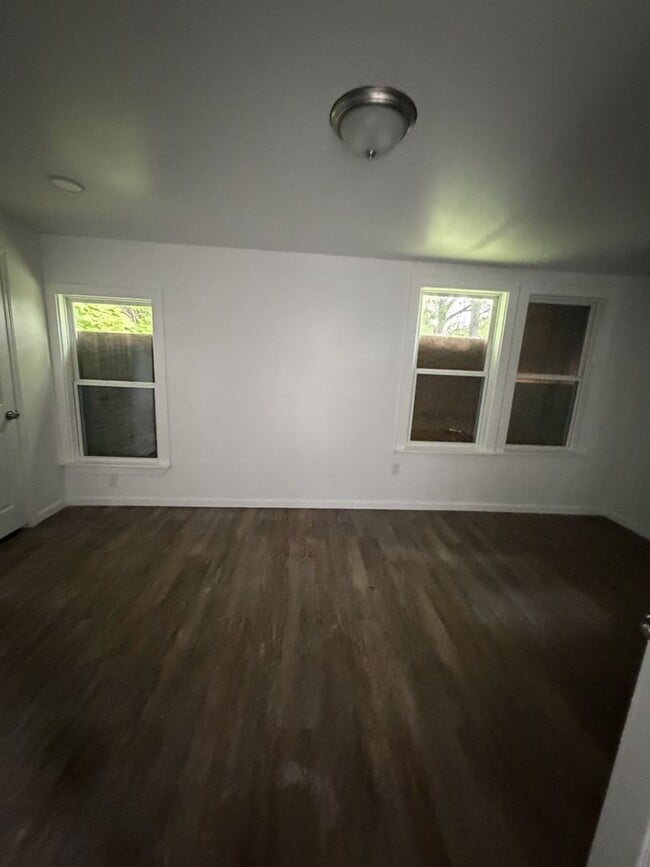 Photo - Spacious 4-Bedroom, 2-Bath House – Unfurnished