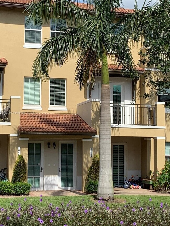 Building Photo - 1044 SW 147th Ave Unit 10105