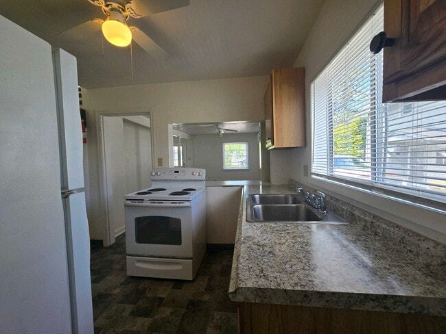 Photo - Cozy 2 Bed, 2 Bath Home with Parking Spaces and a Fenced Backyard!