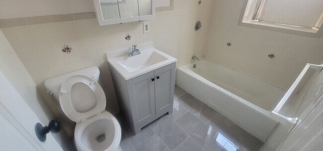 Photo - No Fee! Newly Renovated Luxury Split!  Heat & Hot Water Included.  Near T!  Great for BU Students