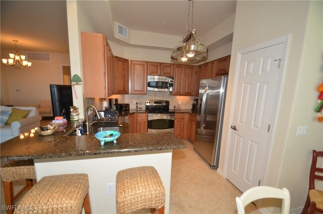 Building Photo - 10572 Smoke House Bay Dr Unit 101