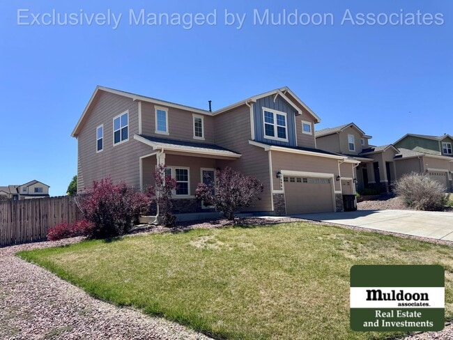 Photo - Spacious 5 Bedroom, 3.5 Bath Home with 3-Car Garage, and Pet-Friendly Living in 80925!