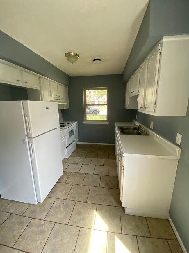 Photo - 3 BEDROOM 2 BATH HOUSE WITH 1 CAR GARAGE