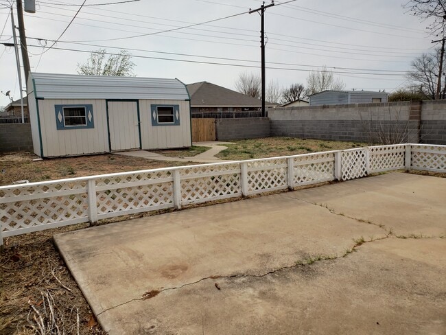 Back patio walkway to shed - 703 NW 7th St