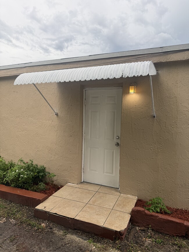 Building Photo - 6387 Coral Way Unit 6387 Studio Apartment