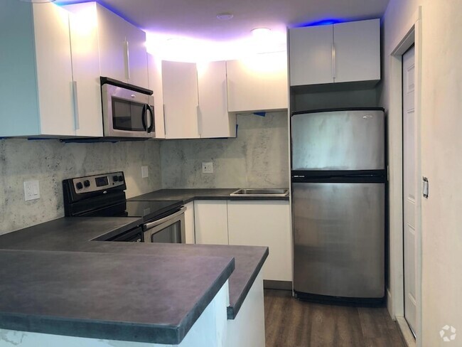 Building Photo - 1298 NE 33rd St Unit A Rental