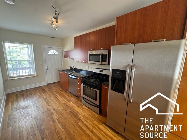 Building Photo - 3650 W Berteau Ave Unit 3 Rental