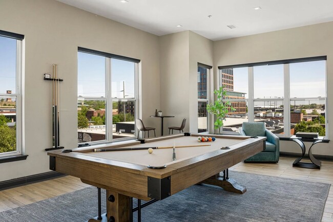 Elevate your lifestyle at Flats on Archer, where leisure meets luxury. Enjoy the vibrant common areas including game rooms and stunning views. This is more than a home; it's a community. Schedule your visit today!