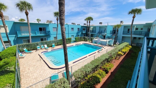 Photo - Cozy Beachside Condo in Cape Canaveral Including pool, basic cable, and water.