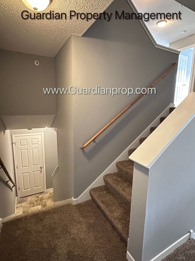 Photo - Champlin Town Home, 2 Car Garage, Dishwasher, Washer/Dryer, Balcony, May/June Move in Dates