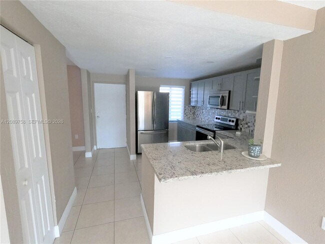 9911 W Okeechobee Rd Unit 1-101