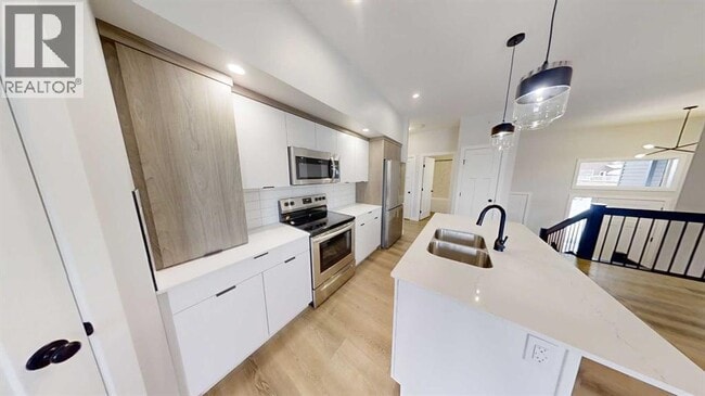 Photo - 10669-10133 133 Ave.