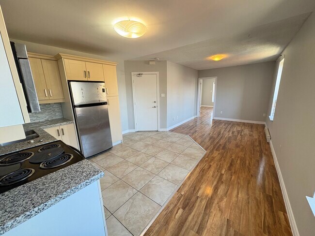 Photo - 2 Bedroom On Corner or King and Locke St Includes Parking Unit 3