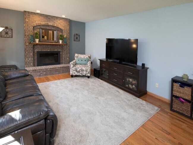 Photo - Elegant 2-Story has 4 BRs on Upper Level, Office, 2 Family Rooms, Fireplace & More!