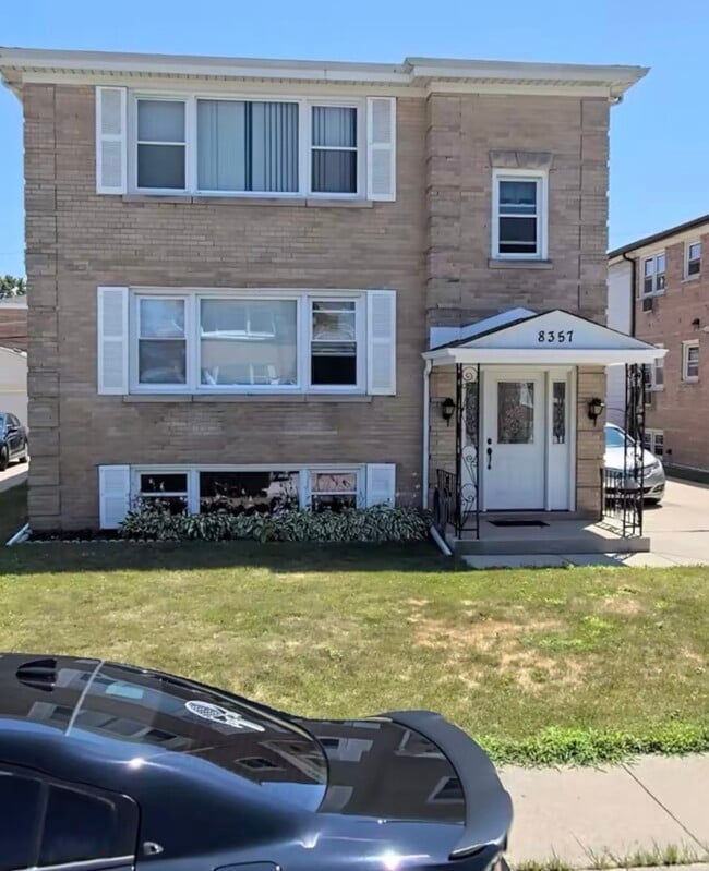 Building Photo - 8357 W Summerdale Ave Unit #1