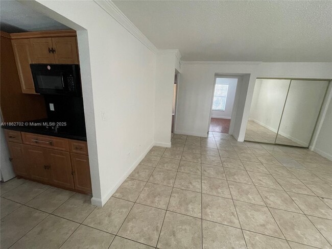 Building Photo - 7105 W 13th Ave Unit 302 Rental