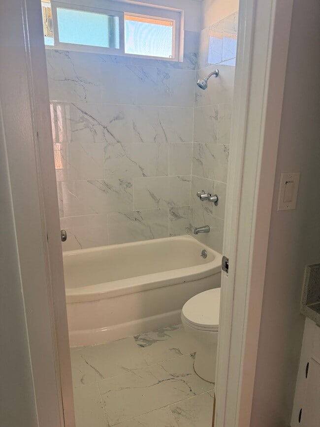Photo - Charming 1 Bedroom Apartment with Pool, Patio & Flexible Month-to-Month Lease