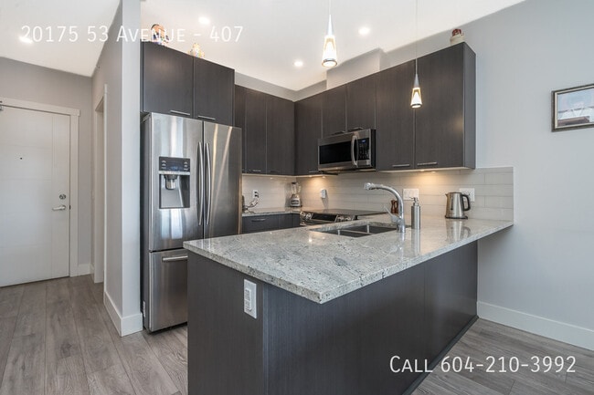 Photo - Furnished Two Bedroom Condo Unité 407