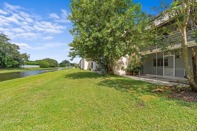 Building Photo - 10693 N Military Trl Unit 7