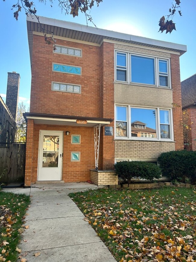 Building Photo - 5645 W 63rd Pl Unit 2