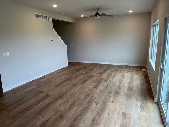 Photo - Spacious 5-Bedroom Duplex Near Asbury Elementary with Finished Basement & Full Amenities