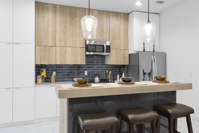 Photo - Modern Townhome with Private Rooftop, Office, and Attached Garage in Dallas Unit 104