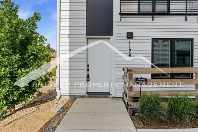 Photo - Spacious Townhouse with Central AC and 2-Car Garage