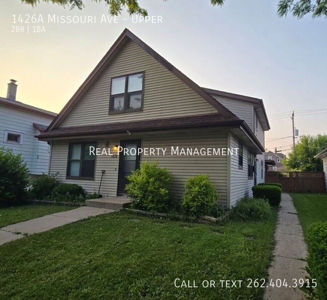 Building Photo - 1426 Missouri Ave Unit Upper