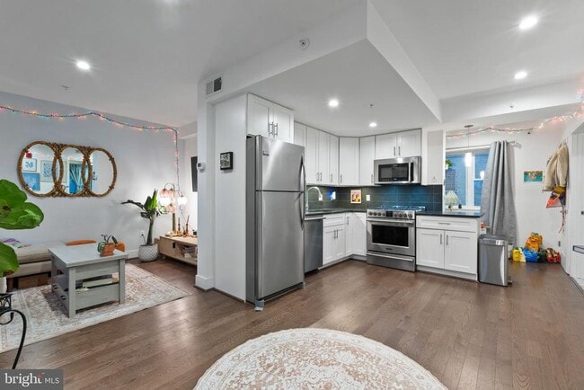 Building Photo - 7723 Alaska Ave NW Unit 103 Rental