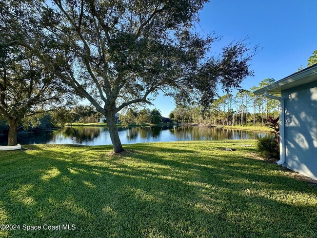 Photo - Charming Four Bedroom Home with a Beautiful Pond in the Back