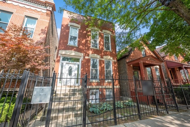 Building Photo - 921 S Oakley Blvd Unit 2
