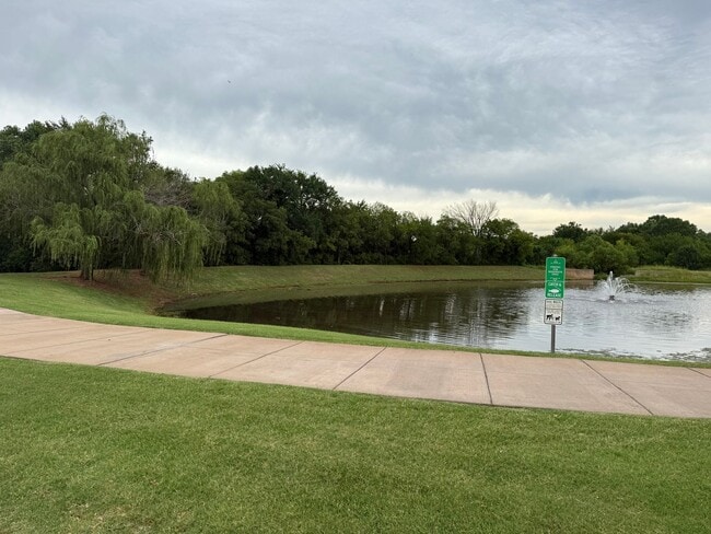 Photo - 3 bedroom + office or 4th bedroom, storm shelter, neighborhood pond and walking track!
