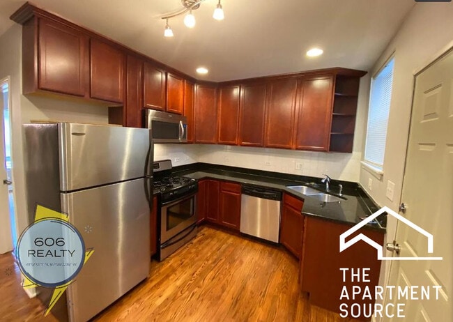 Building Photo - 2704 W Arthur Ave Unit 3S