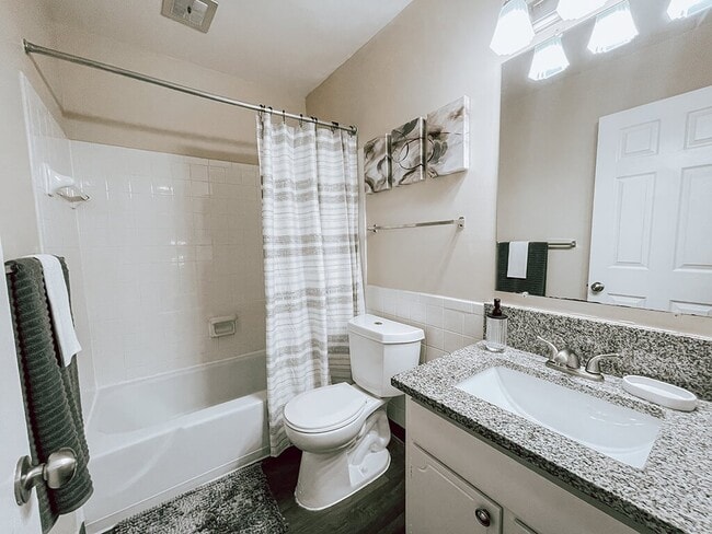Full Bathroom with Granite Counter