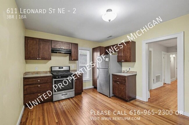 Building Photo - 611 Leonard St NE Unit 2