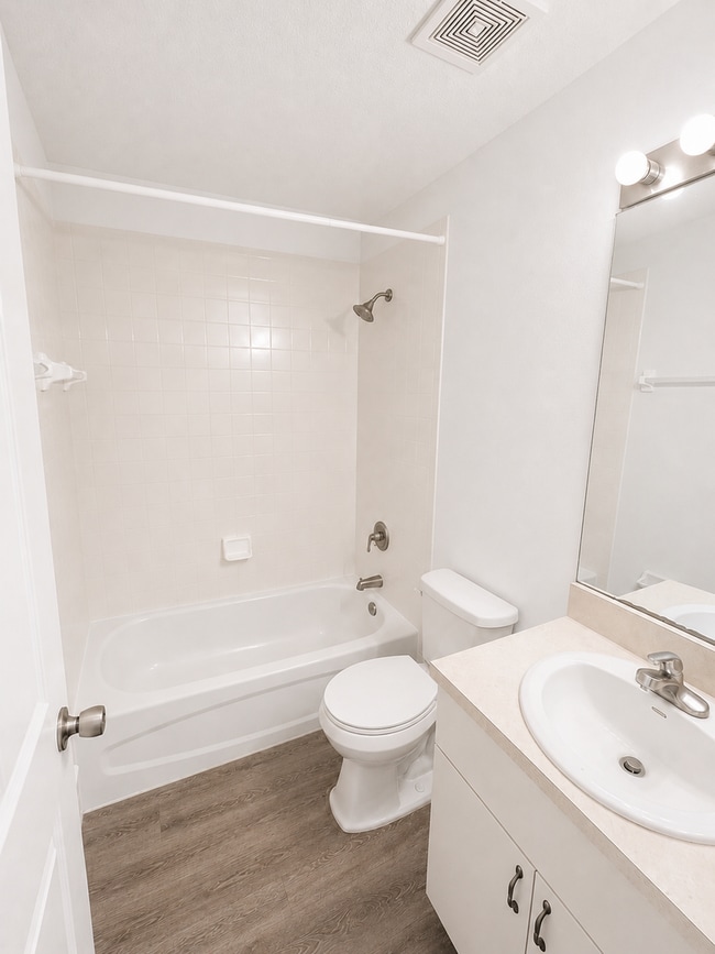 Photo - Spacious 2BR/1BA Duplex with Vaulted Ceilings & Wood-Style Flooring!