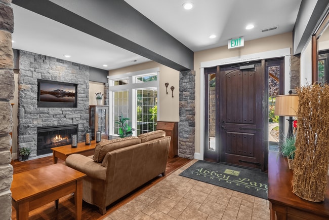 Cozy clubhouse lounge with fireplace.