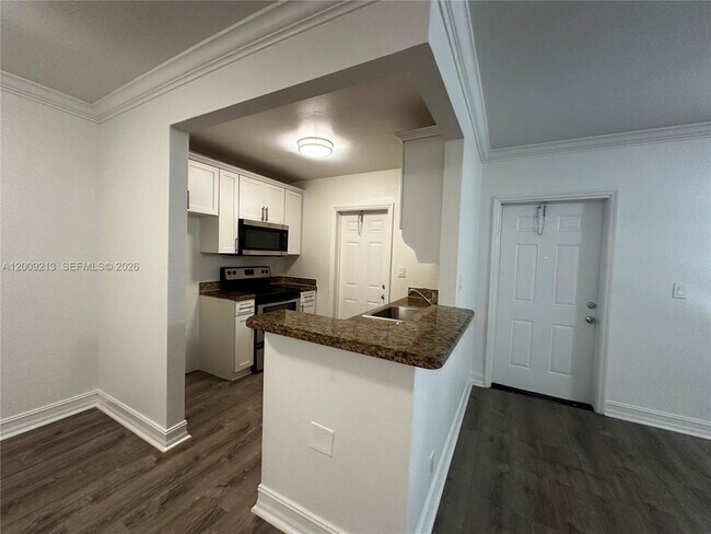 Photo - 1400 NE 56th St Unidad 103