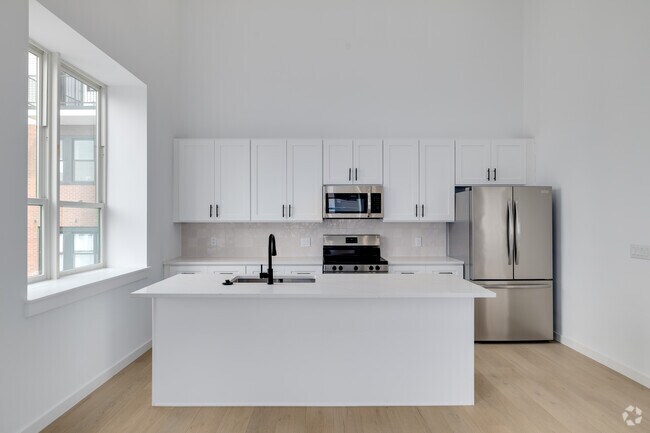 2BR, 2BA - 1,215SF - Kitchen - Atlas Lofts