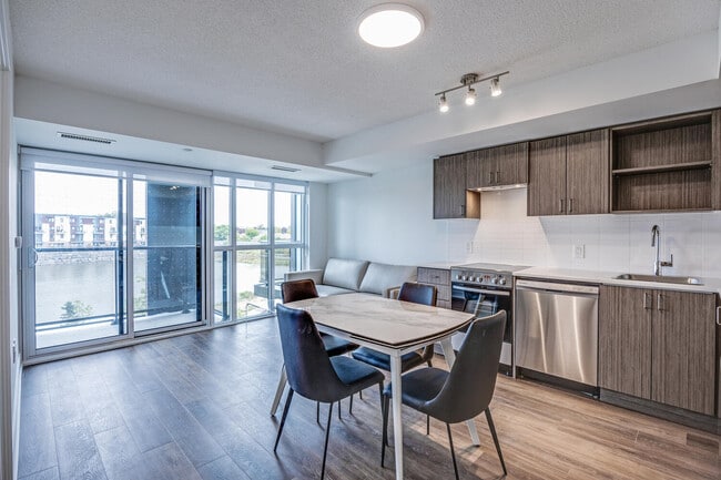 Building Photo - One Plus Den Furnished Unit 302