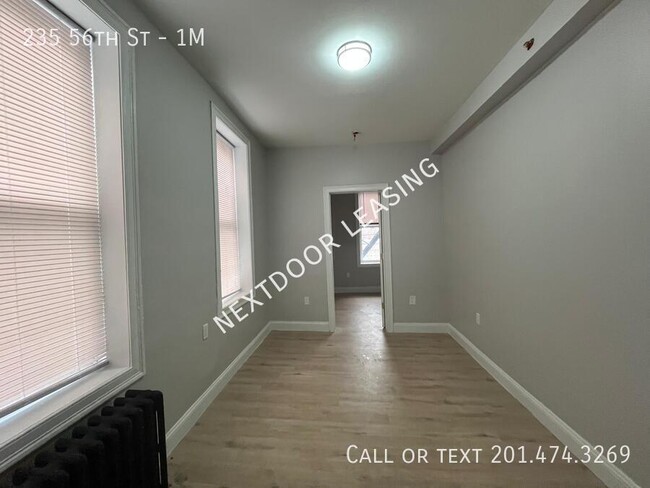 Photo - 235 56th St Unidad 1M