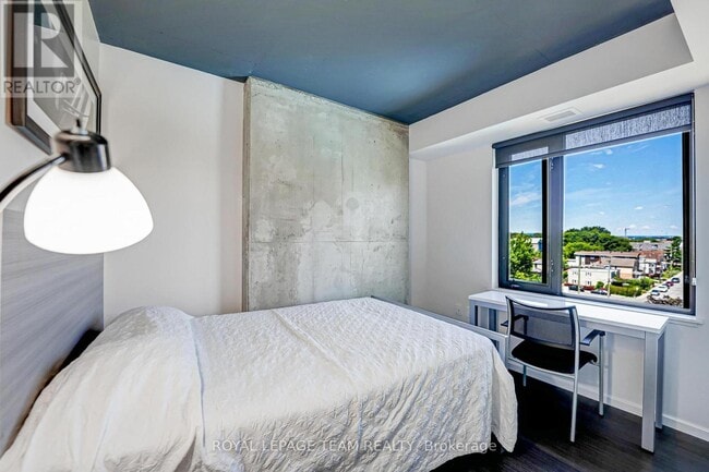 Photo - 105 Champagne Ave S Unit 703