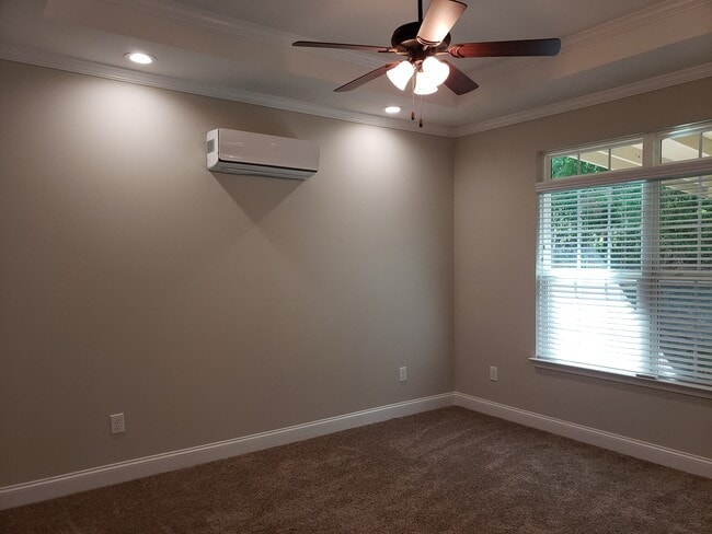 Woodland Springs Townhomes | Spacious Bedrooms w/ Ceiling Fans