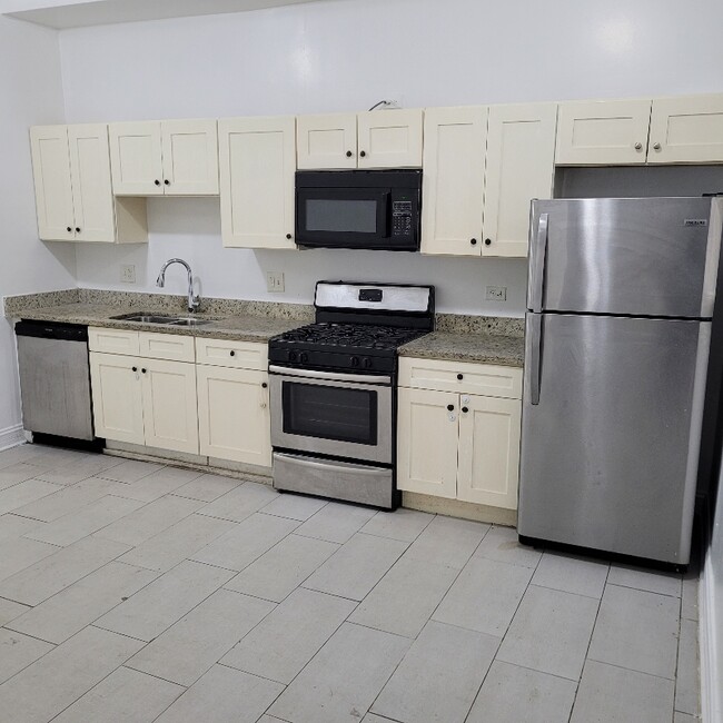 Building Photo - 6751 S Clyde Ave Unit Bsmt