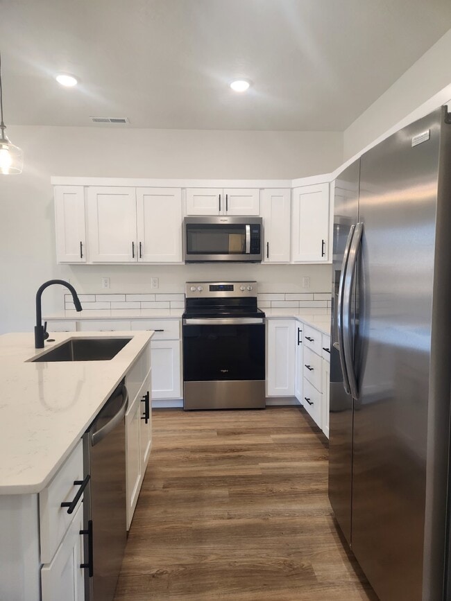 Photo - "Modern Comfort Awaits: Spacious and NEW 3-Bed Townhouse Available June 1st!