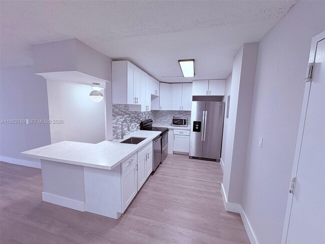 Building Photo - 16465 NE 22nd Ave Unit 219