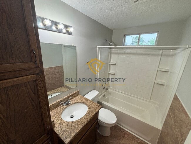 Photo - Charming 2-Bedroom Home with Spacious Yard Near Garfield Park, Available NOW!
