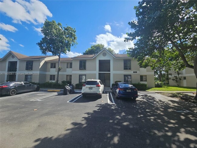 Building Photo - 713 Gardens Dr Unit 205